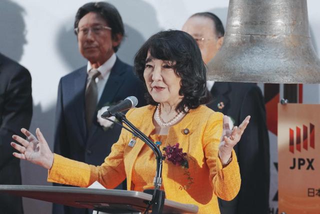 Japan's Finance Minister Satsuki Katayama (C) delivers a speech during the opening ceremony to celebrate the first trading day of the year at the Tokyo Stock Exchange in Tokyo on January 5, 2026. (Photo by Kazuhiro NOGI / AFP)
