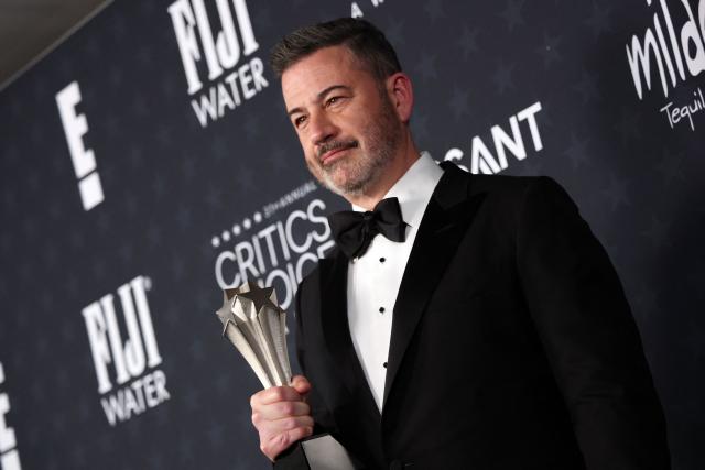TV host Jimmy Kimmel poses in the press room with the Best Talk Show award for "Jimmy Kimmel Live!" during the 31st Annual Critics Choice Awards at Barker Hangar in Santa Monica, California, on January 4, 2026. (Photo by Michael Tran / AFP)