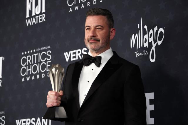 TV host Jimmy Kimmel poses in the press room with the Best Talk Show award for "Jimmy Kimmel Live!" during the 31st Annual Critics Choice Awards at Barker Hangar in Santa Monica, California, on January 4, 2026. (Photo by Michael Tran / AFP)