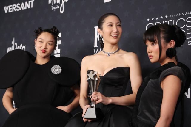 (L-R) US singer Audrey Nuna, US singer EJAE, and Rei Ami, winners of the Best Animated Feature Award for "KPop Demon Hunters", pose in the press during the 31st Annual Critics Choice Awards at Barker Hangar in Santa Monica, California, on January 4, 2026. (Photo by Michael Tran / AFP)
