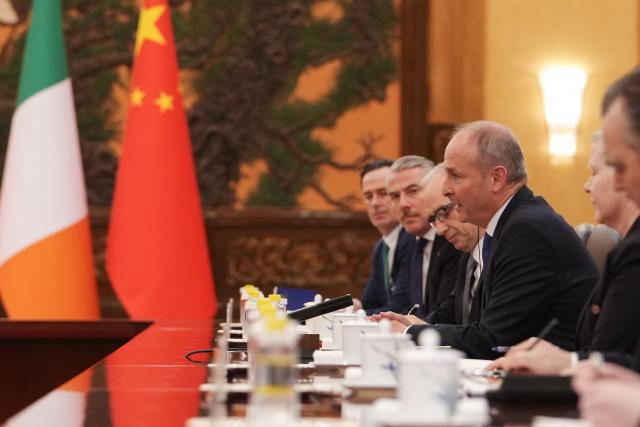 Ireland's Prime Minister Micheal Martin speaks during a bilateral meeting with China's President Xi Jinping at the Great Hall of the People in Beijing on January 5, 2026. (Photo by Andy Wong / POOL / AFP)