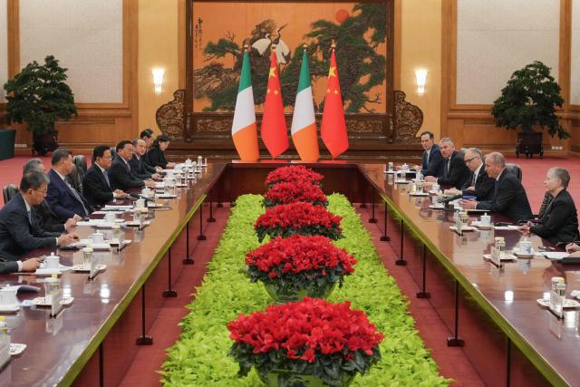 Ireland's Prime Minister Micheal Martin (2nd R) talks to China's President Xi Jinping (3rd L) during a bilateral meeting at the Great Hall of the People in Beijing on January 5, 2026. (Photo by Andy Wong / POOL / AFP)