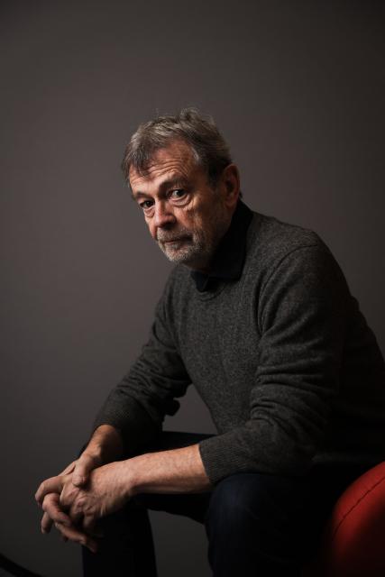 (FILES) French writer Pierre Lemaitre poses during a photo session in Paris on January 17, 2025. Pierre Lemaitre's new novel "Les belles promesses" (The Beautiful Promises) is released on January 6, 2026. (Photo by Thibaud MORITZ / AFP)