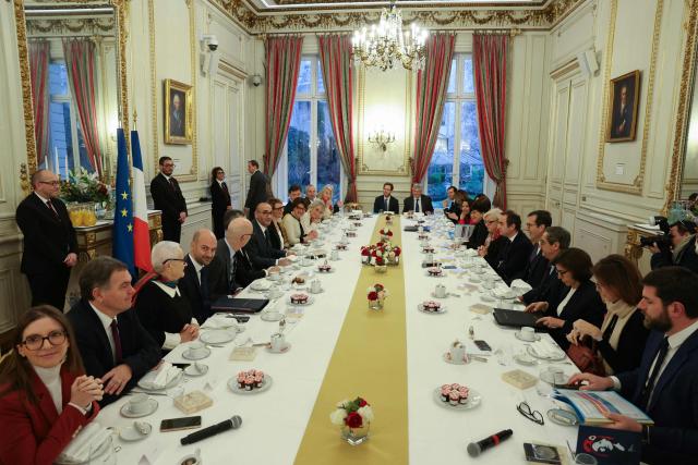 France's Prime Minister Sebastien Lecornu (6th-R), France's Interior Minister Laurent Nunez (7th-L), France's Foreign Affairs Minister Jean-Noel Barrot (4th-L), France's junior Minister in charge of equality Aurore Berge (L) take part in a breakfast with ministers at French Interior ministry Hotel de Beauvau in Paris on January 5, 2026. (Photo by Thomas SAMSON / POOL / AFP)
