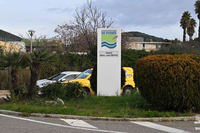 A photo shows a sign for the Hyeres hospital after a fire broke out overnight in the emergency service killing one person in Hyeres, southeastern France, on January 5, 2026. A 75-year-old man died on January 5 morning in his cubicle while being treated by the emergency services in Hyeres, according to sources close to the case. The fire broke out at around 4 am and led to the evacuation of 32 people ‘horizontally,’ including 19 patients to the hospital's maternity ward, according to the fire department, which said the fire had been brought under control by a security guard and a caregiver. (Photo by Miguel MEDINA / AFP)