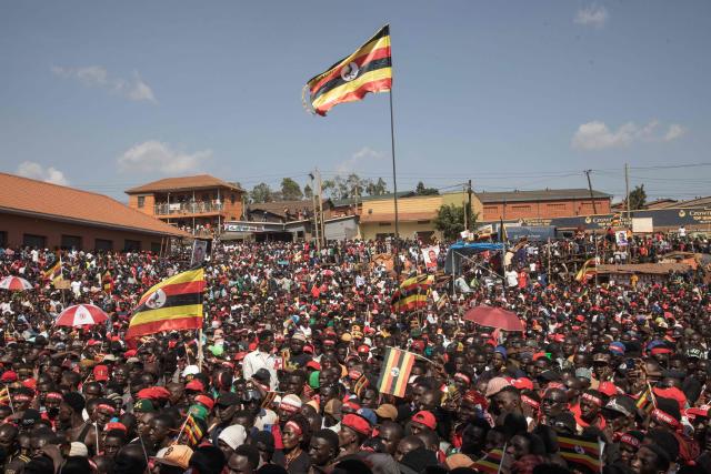 (FILES) Supporters of National Unity Platform (NPU) presidential candidate and opposition leader Robert Kyagulanyi, also known as Bobi Wine, gather to attend a presidential campaign rally in Kampala, on November 24, 2025. Uganda's presidential and parliamentary elections are scheduled for January 15, 2026. (Photo by BADRU KATUMBA / AFP)