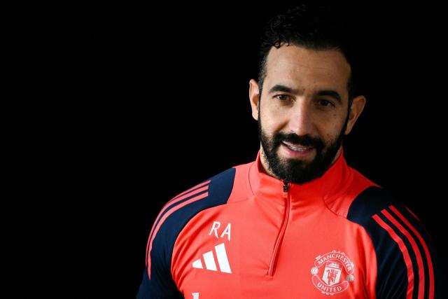 (FILES) Manchester United's Portuguese head coach Ruben Amorim reacts as he speaks during a press conference at the Carrington Training Complex in Manchester, north-west England on January 22, 2025 on the eve of their UEFA Europa league football match against Glasgow Rangers. Ruben Amorim has been sacked as Manchester United manager 14 months after arriving at Old Trafford, the club announced on January 5, 2025. (Photo by Oli SCARFF / AFP)