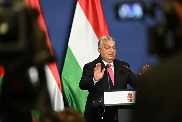 Hungary's Prime Minister Viktor Orban gestures as he addresses his annual press conference in the Carmelita Monastery, seat of the Hungarian premier, in Budapest, Hungary, on January 5, 2026. (Photo by Attila KISBENEDEK / AFP)