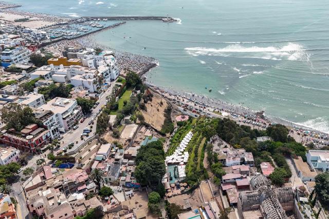 Aerial view of the waterfront in Barranco, Lima on January 4, 2026. (Photo by Connie FRANCE / AFP)