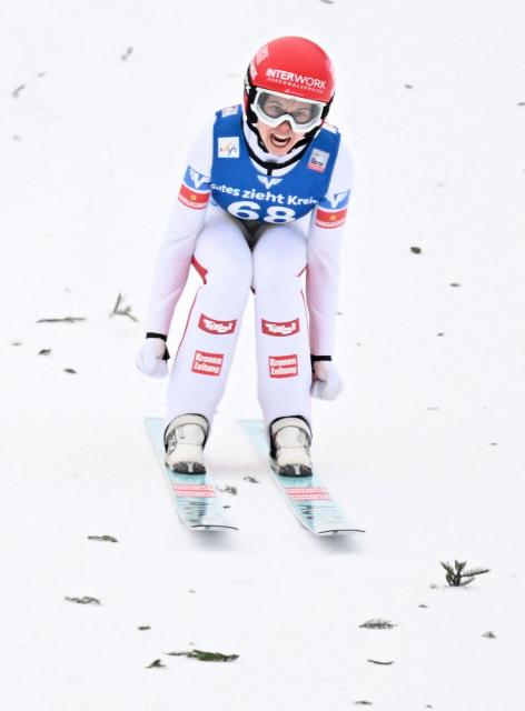 Second placed Austria's Lisa Eder reacts after competing in the normal hill HS98 event of the women's FIS Ski Jumping World Cup in Villach, Austria on January 5, 2026. (Photo by BARBARA GINDL / APA / AFP) / Austria OUT