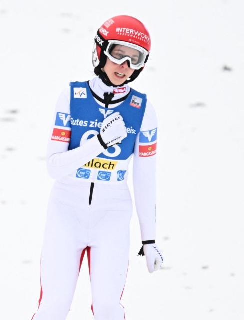 Second placed Austria's Lisa Eder reacts after competing in the normal hill HS98 event of the women's FIS Ski Jumping World Cup in Villach, Austria on January 5, 2026. (Photo by BARBARA GINDL / APA / AFP) / Austria OUT