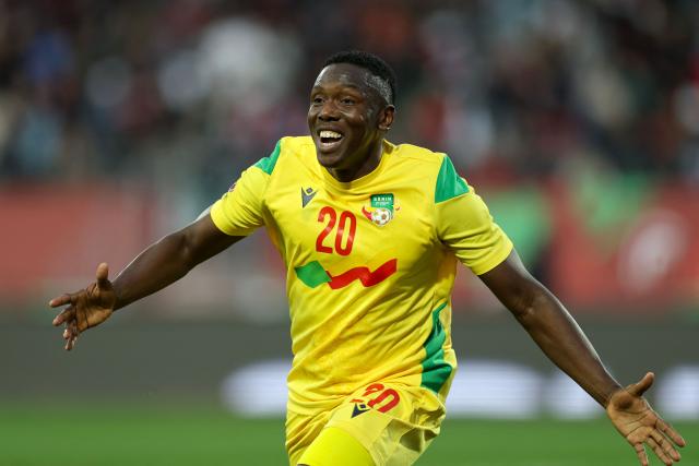 TOPSHOT - Benin's forward #20 Jodel Dossou celebrates scoring his team's first goal during the Africa Cup of Nations (CAN) round of 16 football match between Egypt and Benin at the Grand Stadium in Agadir on January 5, 2026. (Photo by FRANCK FIFE / AFP)