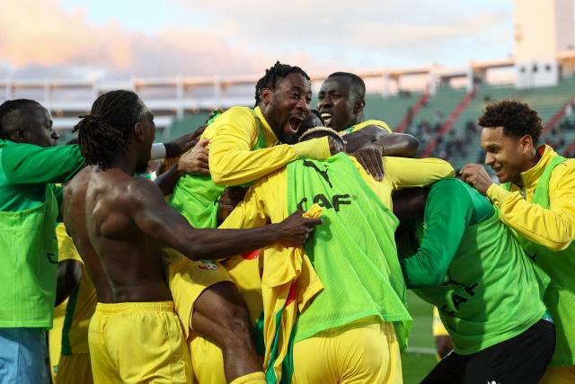 Benin's players celebrate scoring their team's first goal during the Africa Cup of Nations (CAN) round of 16 football match between Egypt and Benin at the Grand Stadium in Agadir on January 5, 2026. (Photo by Franck FIFE / AFP)