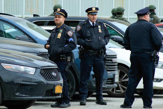 New York City Police Department (NYPD) officers stand guard outside the Metropolitan Detention Center in the Brooklyn borough of New York City, where ousted Venezuelan president Nicolas Maduro is being held on January 5, 2026. Deposed Venezuelan president Nicolas Maduro pleaded not guilty to charges of narco-terrorism in a New York court on Monday, two days after being snatched by US forces in a stunning raid on his home in Caracas. Maduro, 63, told a federal judge in Manhattan that he had been "kidnapped" from Venezuela and said "I'm innocent, I'm not guilty," US media reported. (Photo by Kena Betancur / AFP)