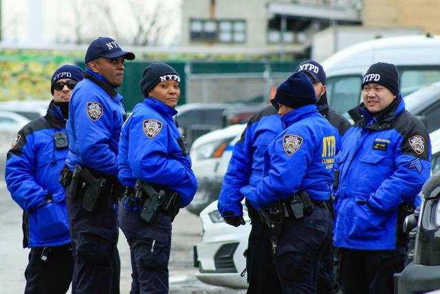 New York City Police Department (NYPD) officers stand guard outside the Metropolitan Detention Center in the Brooklyn borough of New York City, where ousted Venezuelan president Nicolas Maduro is being held on January 5, 2026. Deposed Venezuelan president Nicolas Maduro pleaded not guilty to charges of narco-terrorism in a New York court on Monday, two days after being snatched by US forces in a stunning raid on his home in Caracas. Maduro, 63, told a federal judge in Manhattan that he had been "kidnapped" from Venezuela and said "I'm innocent, I'm not guilty," US media reported. (Photo by Kena Betancur / AFP)
