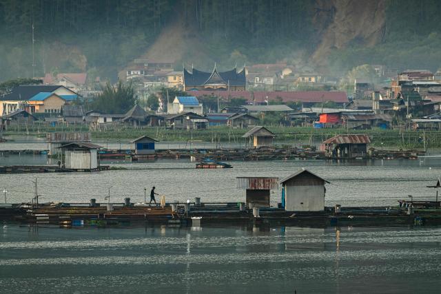 This photo shows a general view of residential houses near an area where a landslide took place following a flash flood in Takengon, Indonesia's Aceh province on January 6, 2025. (Photo by CHAIDEER MAHYUDDIN / AFP/Chaideer MAHYUDDIN / AFP)