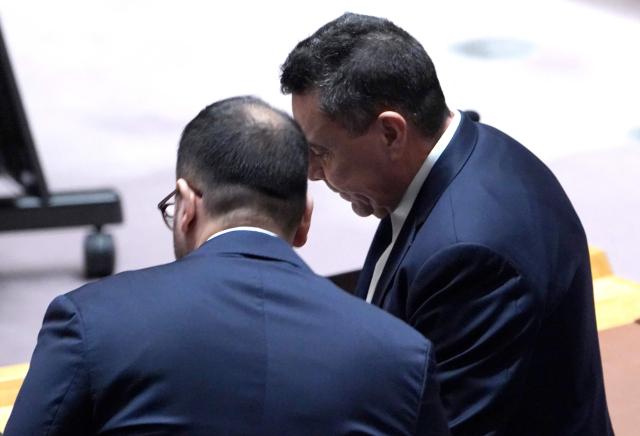 Venezuela Ambassador to the United Nations Samuel Moncada (R) listens during a UN Security Council emergency meeting to discuss recent US actions in Venezuela on January 5, 2026 in New York. Leftist strongman Nicolas Maduro, 63, faces narcotrafficking charges along with his wife, who was also seized and taken out of Caracas in the shock US assault on January 3, which involved commandos, bombing by jet planes, and a massive naval force off Venezuela's coast. (Photo by John Lamparski / AFP)