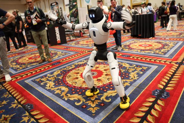 The Agibot X2 humanoid robot dances as it is demonstrated during Pepcom ahead of the annual Consumer Electronics Show (CES) in Las Vegas, Nevada on January 5, 2026. (Photo by Patrick T. Fallon / AFP)