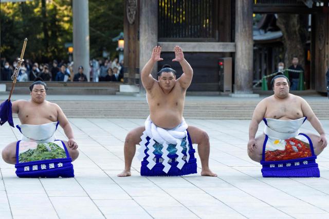 Mongolian-born Hoshoryu (C), who holds the highest rank of Yokozuna (grand champion) in sumo wrestling, performs the dedication ring-entering ceremony at Meiji Jingu Shrine in Tokyo on January 6, 2026.  (Photo by Kazuhiro NOGI / AFP)
