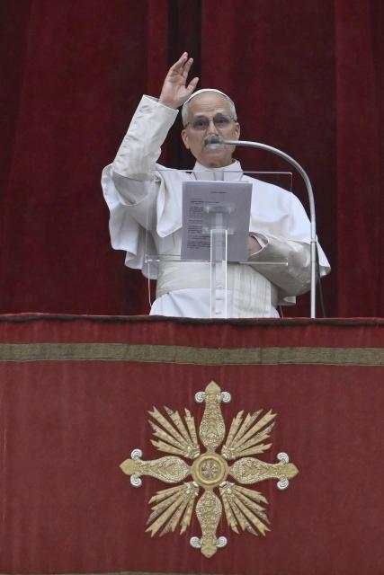 Pope Leo XIV addresses the crowd from the central balcony of St Peter's basilica overlooking St. Peter's square during the Angelus prayer in The Vatican on January 6, 2026. (Photo by Filippo MONTEFORTE / AFP)