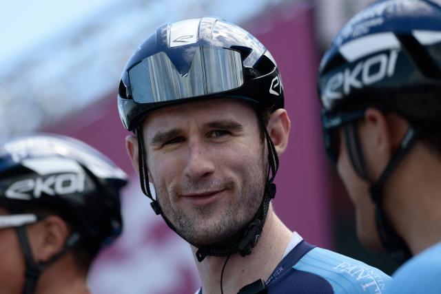 (FILES) Canadian rider Derek Gee is pictured on stage before the 8th stage of the 108th Giro d'Italia cycling race of 197kms from Giulianova to Castelraimondo on May 17, 2025. Cyclist Derek Gee has agreed to join Lidl-Trek until 2028, the German outfit announced on January 6, 2026, as his former team said they had resolved their contract dispute with the Canadian. (Photo by Luca Bettini / AFP)