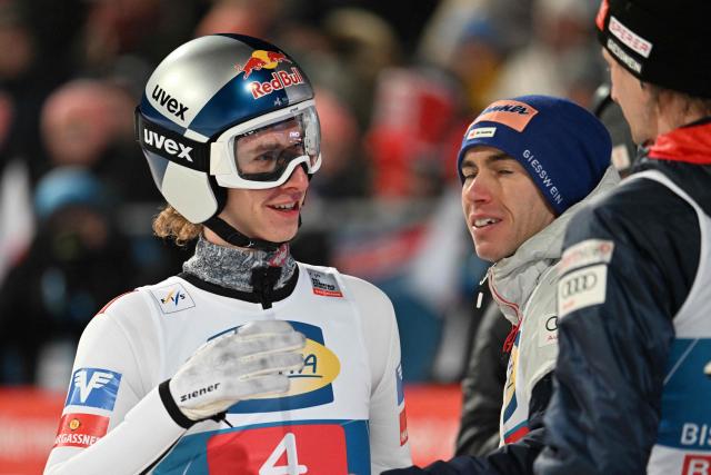 Austria's Daniel Tschofenig reacts after competing in the Men's Individual Large Hill HS142 event of the FIS Ski Jumping World Cup, the fourth and last leg of the Four Hills Tournament, in Bischofshofen, Austria on January 6, 2026. (Photo by KERSTIN JOENSSON / AFP)