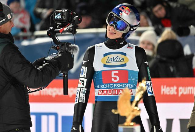 Japan's Ryoyu Kobayashi reacts after competing in the Men's Individual Large Hill HS142 event of the FIS Ski Jumping World Cup, the fourth and last leg of the Four Hills Tournament, in Bischofshofen, Austria on January 6, 2026. (Photo by KERSTIN JOENSSON / AFP)
