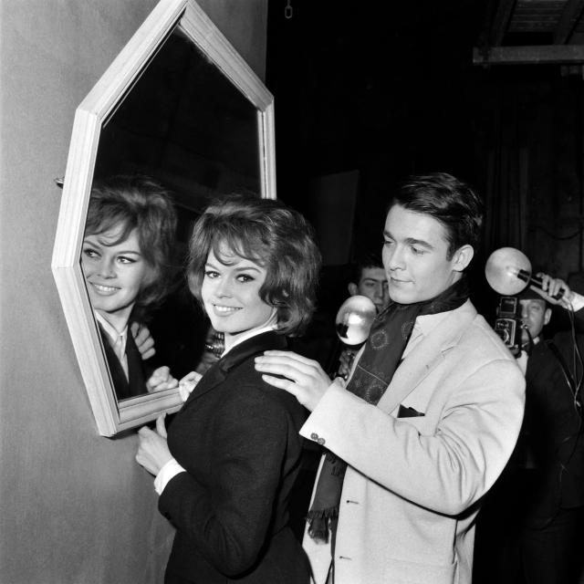 (FILES) French actress Brigitte Bardot and soon-to-be-husband actor Jacques Charrier on the set of "Babette s'en va-t-en guerre" directed by Christian-Jaque, at the Saint-Maurice Studios on March 6, 1959. The funeral of French actress Brigitte Bardot, who died at 91 on December 28, 2025, will take place in Saint-Tropez on January 7, 2026. (Photo by AFP)