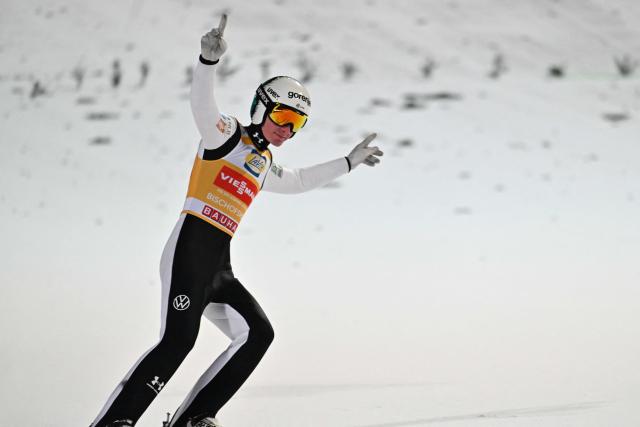Slovenia's Domen Prevc reacts after competing in the Men's Individual Large Hill HS142 event of the FIS Ski Jumping World Cup, the fourth and last leg of the Four Hills Tournament, in Bischofshofen, Austria on January 6, 2026. (Photo by KERSTIN JOENSSON / AFP)