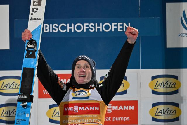 Overall winner Slovenia's Domen Prevc celebrates after the Men's Individual Large Hill HS142 event of the FIS Ski Jumping World Cup, the fourth and last leg of the Four Hills Tournament, in Bischofshofen, Austria on January 6, 2026. (Photo by KERSTIN JOENSSON / AFP)