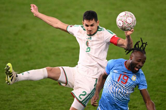 TOPSHOT - Algeria's defender #2 Aissa Mandi and Democratic Republic Of Congo's forward #19 Fiston Mayele during the Africa Cup of Nations (CAN) round of 16 football match between Algeria and Democratic Republic of Congo at the Prince Moulay El Hassan
Stadium in Rabat on January 6, 2026. (Photo by SEBASTIEN BOZON / AFP)