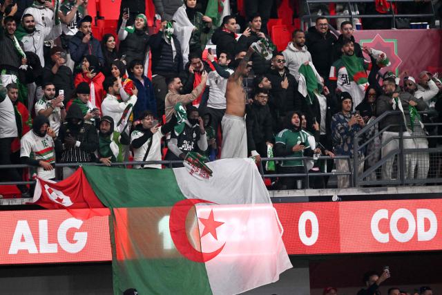 Algeria supporters celebrate after the Africa Cup of Nations (CAN) round of 16 football match between Algeria and Democratic Republic of Congo at the Prince Moulay El Hassan
Stadium in Rabat on January 6, 2026. (Photo by SEBASTIEN BOZON / AFP)