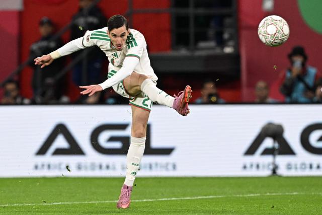 TOPSHOT - Algeria's forward #27 Adil Boulbina scores his team's first goal during the Africa Cup of Nations (CAN) round of 16 football match between Algeria and Democratic Republic of Congo at the Prince Moulay El Hassan
Stadium in Rabat on January 6, 2026. (Photo by Gabriel BOUYS / AFP)