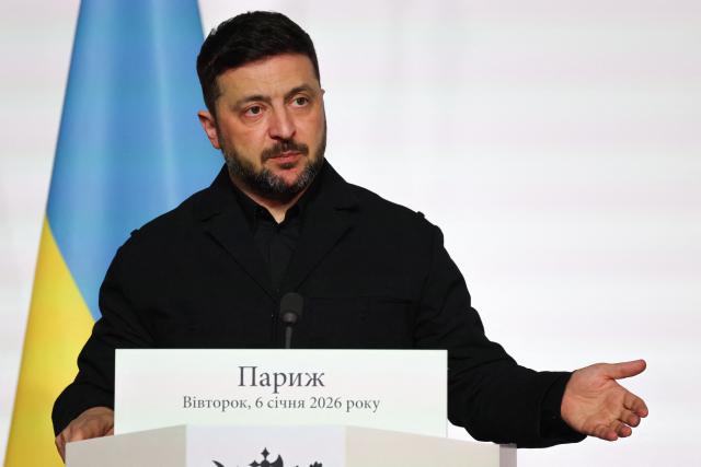 Ukraine's President Volodymyr Zelensky delivers a press conference upon the signing of the declaration on deploying post-ceasefire force in Ukraine during the Coalition of the Willing summit on security guarantees for Ukraine, at the Elysee Palace in Paris on January 6, 2026. The summit of the group of Ukraine supporters dubbed the "Coalition of the Willing" is the latest of several meetings planned for the new year as diplomatic efforts to end Europe's deadliest conflict since World War II have gained pace in recent weeks. (Photo by Ludovic MARIN / POOL / AFP)