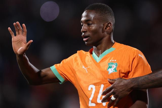 Ivory Coast's forward #24 Bazoumana Toure celebrates scoring the team's third goal during the Africa Cup of Nations (CAN) round of 16 football match between Ivory Coast and Burkina Faso at the Grand Stadium in Marrakesh on January 6, 2026. (Photo by FRANCK FIFE / AFP)
