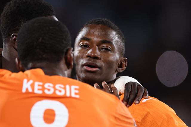 Ivory Coast's forward #24 Bazoumana Toure celebrates scoring the team's third goal during the Africa Cup of Nations (CAN) round of 16 football match between Ivory Coast and Burkina Faso at the Grand Stadium in Marrakesh on January 6, 2026. (Photo by FRANCK FIFE / AFP)