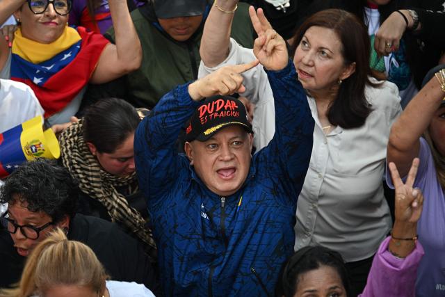 Venezuela's Minister of Interior Diosdado Cabello attends a women's rally in support of ousted Venezuela's President Nicolas Maduro and his wife Cilia Flores in Caracas on January 6, 2026. US forces killed 55 Venezuelan and Cuban military personnel during their stunning raid to capture Nicolas Maduro, tolls published by Caracas and Havana showed January 6. (Photo by Federico PARRA / AFP)