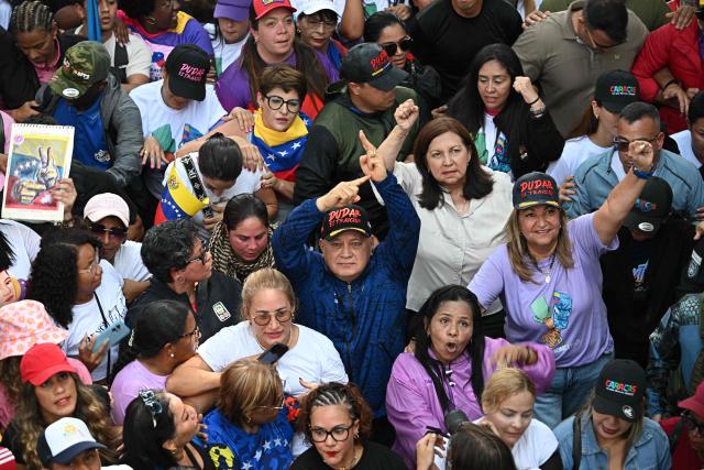 Venezuela's Minister of Interior Diosdado Cabello attends a women's rally in support of ousted Venezuela's President Nicolas Maduro and his wife Cilia Flores in Caracas on January 6, 2026. US forces killed 55 Venezuelan and Cuban military personnel during their stunning raid to capture Nicolas Maduro, tolls published by Caracas and Havana showed January 6. (Photo by Federico PARRA / AFP)