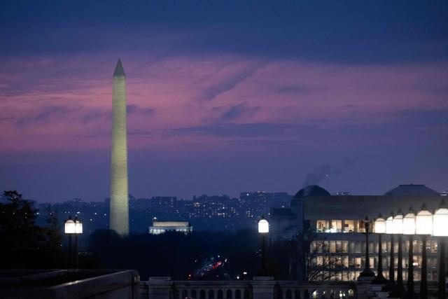 The Washington Monument is seen on the National Mall at sunset in Washington, DC, on January 6, 2026. (Photo by SAUL LOEB / AFP)