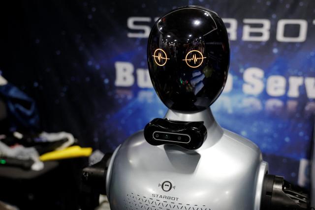 StarBot’s “ChaCha", a hotel and restaurant service robot, is on display at the annual Consumer Electronics Show (CES) in Las Vegas, Nevada, on January 6, 2026. (Photo by Caroline Brehman / AFP)