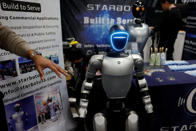 StarBot’s “Shadow", a hotel and restaurant service robot, is on display at the annual Consumer Electronics Show (CES) in Las Vegas, Nevada, on January 6, 2026. (Photo by Caroline Brehman / AFP)