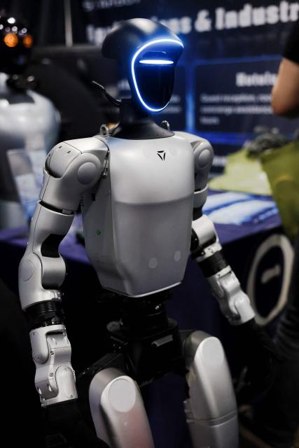 StarBot’s “Shadow", a hotel and restaurant service robot, is on display at the annual Consumer Electronics Show (CES) in Las Vegas, Nevada, on January 6, 2026. (Photo by Caroline Brehman / AFP)