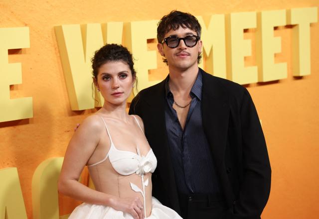 US actress Emily Bader and English actor Tom Blyth attend the Netflix premiere of "People We Meet on Vacation" at the Egyptian theatre in Hollywood, California on January 6, 2026. (Photo by Michael Tran / AFP)