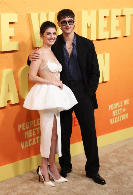US actress Emily Bader and English actor Tom Blyth attend the Netflix premiere of "People We Meet on Vacation" at the Egyptian theatre in Hollywood, California on January 6, 2026. (Photo by Michael Tran / AFP)