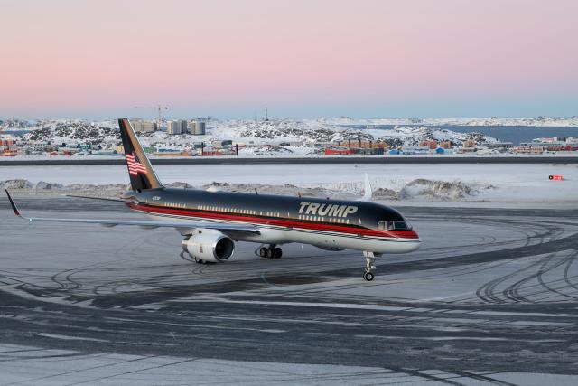 (FILES) An aircraft carrying US businessman Donald Trump Jr. arrives in Nuuk, Greenland on January 7, 2025. US President Donald Trump is discussing options including military action to take control of Greenland, the White House said on January 6, 2026, upping tensions that Denmark warns could destroy the NATO alliance. Trump has stepped up his designs on the mineral-rich, self-governing Danish territory in the arctic since the US military seized Venezuelan leader Nicolas Maduro last weekend. (Photo by Emil Stach / Ritzau Scanpix / AFP) / Denmark OUT