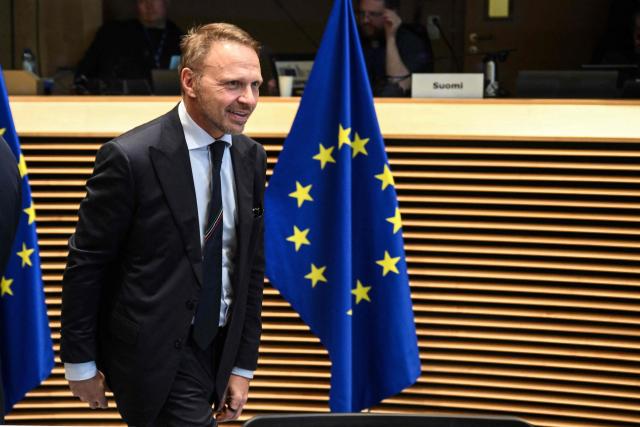 Italy's Minister of Agriculture Francesco Lollobrigida reacts as he arrives prior to a meeting with EU agriculture ministers on the Mercosur agreement, at the European Commission, in Brussels, on January 7, 2026. (Photo by Nicolas TUCAT / AFP)