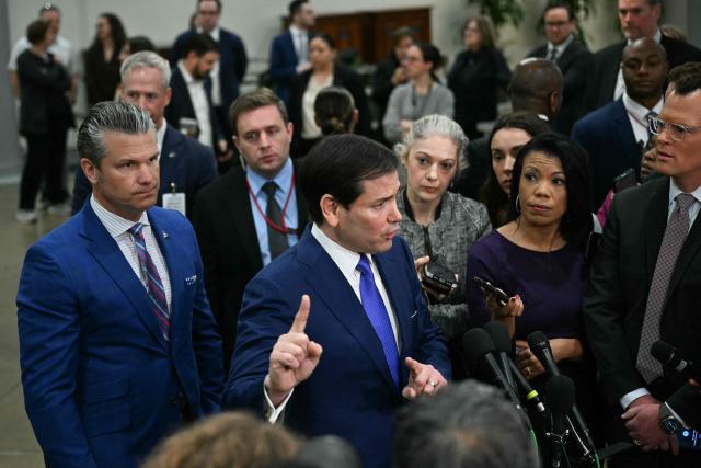 (L/R) US Secretary of Defense Pete Hegseth and US Secretary of State Marco Rubio speak to reporters after they briefed Senators on the recent US military actions in Venezuela, on Capitol Hill in Washington, DC on January 7, 2026. (Photo by Brendan SMIALOWSKI / AFP)