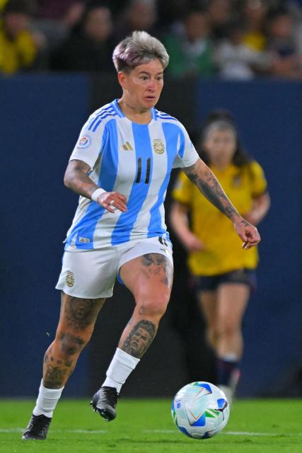 (FILES) Argentina's forward #11 Yamila Rodriguez controls the ball during the Women's Copa America 2025 football match between Ecuador and Argentina at the IDV stadium in Quito on July 24, 2025. The women's national teams of Colombia and Argentina will compete in the traditional She Believes Cup 2026 women's football tournament, which will be held in March in the US, the host team announced on January 7. (Photo by Rodrigo BUENDIA / AFP)
