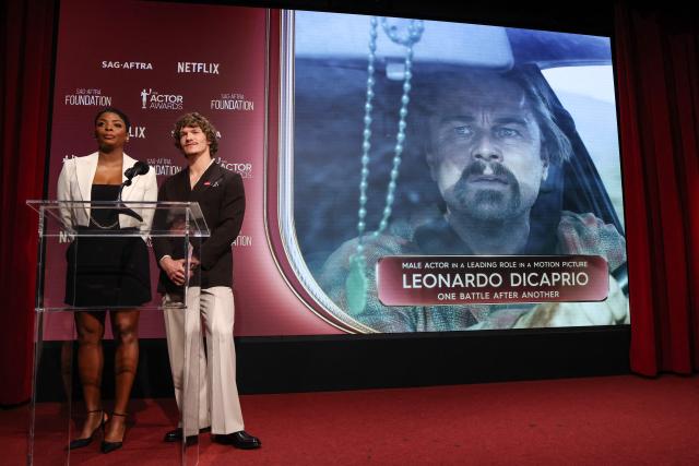 (L/R) US actress Janelle James and US actor Connor Storrie announce Leonardo DiCaprio as a nominee for Best Male Actor in a Leading Role in a Motion Picture during the 32nd Annual Actors Awards nominations announcement at the SAG-AFTRA Foundation's Tom Hanks & Rita Wilson theatre in Los Angeles on January 7, 2026. (Photo by VALERIE MACON / AFP)