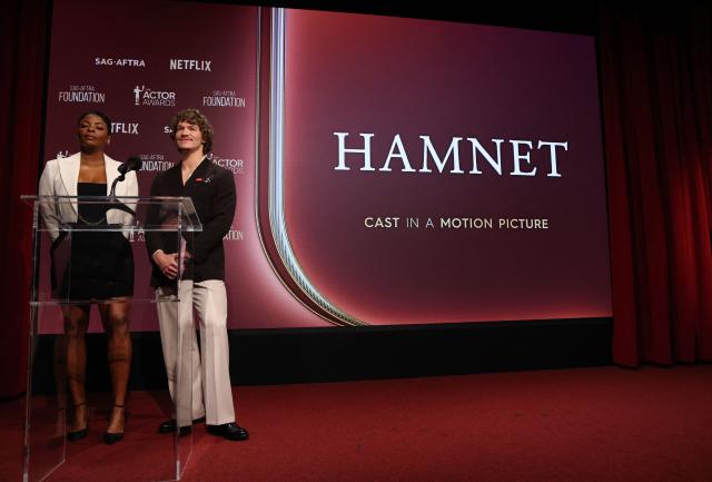 (L/R) US actress Janelle James and US actor Connor Storrie announce "Hamnet" as a nominee for Best Cast in a Motion Picture during the 32nd Annual Actors Awards nominations announcement at the SAG-AFTRA Foundation's Tom Hanks & Rita Wilson theatre in Los Angeles on January 7, 2026. (Photo by VALERIE MACON / AFP)